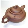 Image 1 : A 19th century Chinese Yixing teapot and cover, the liver red globular body sparsely dusted with go.