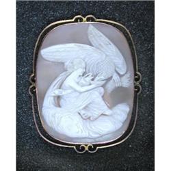 A rectangular carved shell cameo depicting Hebe feeding the eagle of Zeus, 50 x 40mm, in 9ct gold b.