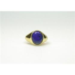 An 18ct gold ring set with cabochon lapis lazuli   £50-70...