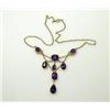 Image 1 : A gold and amethyst fringe necklace mounted with rectangular, oval and tear shaped stones   £100-15.
