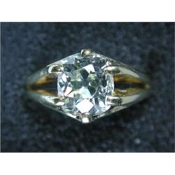 An 18ct gold diamond ring with a cushion shaped old cut stone, approximately 2.2ct   £4,250-4,500...