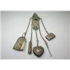 Image 1 : A Victorian silver chatelaine by John and Henry King, London 1894, the belt clip and drops cast wit.