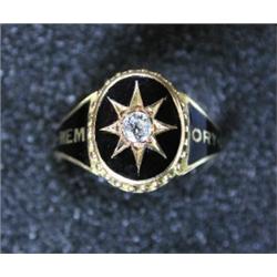 A Victorian 15ct gold and black enamel mourning ring set with a single diamond, Chester 1880   £100.