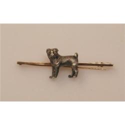 A 9ct gold blade brooch mounted with the figure of a Pug dog, 5cm   £60-80...