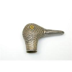 A silver parasol handle (unmarked), modelled as the head of a duck, applied with glass eyes, 8cm...
