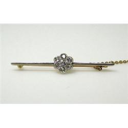 An 18ct gold and diamond blade brooch set with a cluster of six old cut stones, 56mm   £350-450...