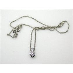 A modern brilliant cut diamond mounted as a pendant on a fine 18ct white gold neckchain   £650-750..
