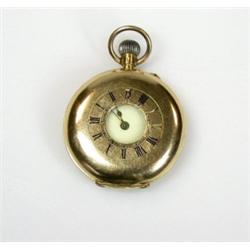 A small 18ct gold cased half hunter cased fob watch, keyless, with white enamel dial, blue enamel n.