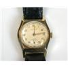 Image 1 : A 9ct gold cased Lady's or boy's wristwatch with silvered round dial with raised Arabic numerals, s.