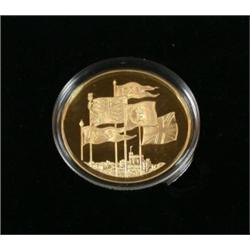 A gold five pound coin, proof issue No.1001 of 2750, commemorating the 70th birthday of HM Queen El.