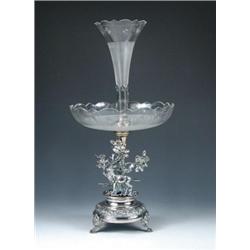 A Victorian electroplate centrepiece epergne, the circular gadrooned base raised on three scrolled..
