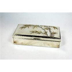 A modern Japanese metalwares table cigarette box, engraved with bamboo, signed, with dark wood lini.