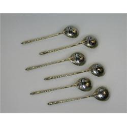 A set of six Russian silver gilt teaspoons, marked for Moscow 1873, with fig shaped bowls with niel.