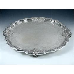 A large Portuguese salver, marked for Opporto, circa 1905, of circular shape with ornate shell deco.