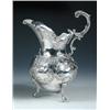 Image 1 : A Portuguese silver jug, marked for Opporto, circa 1905, the body pear shaped and embossed with scr.