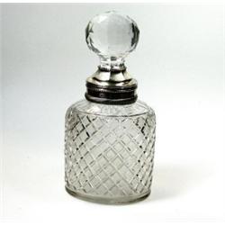 A 19th century Dutch lead crystal decanter with silver collar, maker GB, 1823, the oval body hobnai.