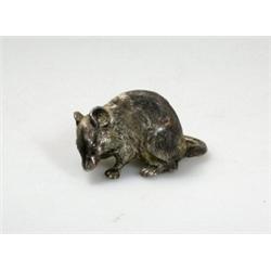 A silver figure of a rat, maker BSEP, London 1977, 4.5cm, 2oz   £40-60...