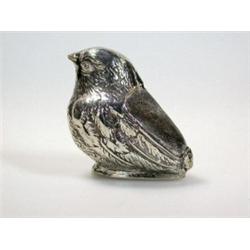 An Edwardian silver pin cushion modelled as a chick, maker HH?, Birmingham 1905, 4cm high   £50-80..