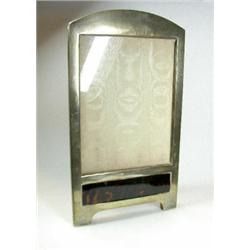 A silver photograph frame, maker's mark indistinct, London 1917, the plain rectangular frame with s.