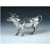 Image 1 : A Dutch silver cow creamer, import marked for Chester 1901, realistically modelled with curling hor.