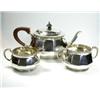 Image 1 : A three piece silver teaset by Mappin & Webb, Sheffield 1919, comprising: a teapot of plain dodecag.