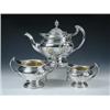 Image 1 : An Art Nouveau silver three piece teaset by the Barnards, London 1911, comprising: a teapot of comp.