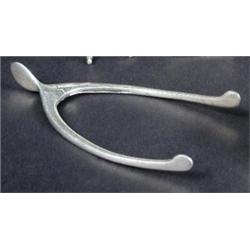A pair of silver sugar tongs by Levi & Salaman, Birmingham 1918, modelled as a wish bone, 9.75cm...