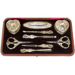 A Victorian Lady's silver manicure set by various makers, Chester and Birmingham 1895, comprising:..