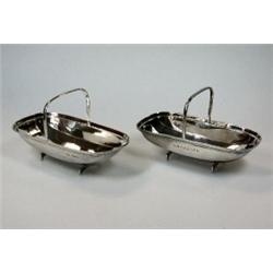 A pair of silver bon bon dishes by James Dixon & Son, Sheffield 1910, each modelled as a garden tru.