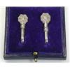 Image 1 : A pair of silver napkin clips by James Dixon & Sons, Sheffield 1913, scroll decorated, cased    £50.
