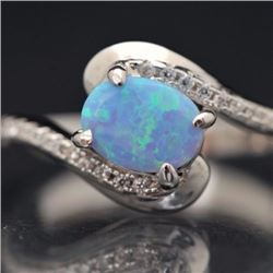 Sterling silver .925 and Synthetic Blue Opal Bypass Ring