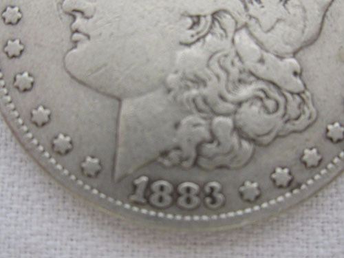 1883 Silver Coin Pluribus Unum One Dollars