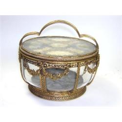 An early 20th century French ormolu mounted glass bowl and cover, the trefoil handle pierced with d.