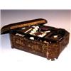 Image 1 : A mid Victorian Chinese lacquer work box, the canted rectangular lid gilt with figures on a black g.