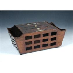 An early Victorian rosewood letter basket, the lockable lid with slots labelled in mother of pearl..