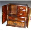 Image 1 : A 19th century burr walnut smoker's cabinet edged in ebony line, the doors opening above a drawer a.