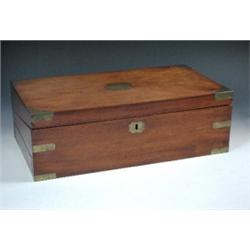 A Victorian mahogany writing slope, the rectangular lid with brass bound corners and escutcheon, th.