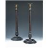 Image 1 : A pair of 19th century stained mahogany candlesticks with gilt brass nozzles and drip pans, the flu.