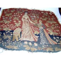 A 19th century Berlin wool work panel worked in gros and petit point with lady and attendant in a g.