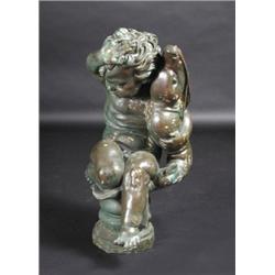 A bronze figural fountain, the naked putto holding a dolphin in his left hand which would spout wat.