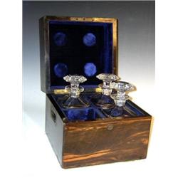 A mid Victorian coromandel wood decanter box, the ebony lined edged square lid closing on 'Bramah'..