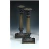 Image 1 : A pair of early 19th century bronze candlesticks, the foliate nozzles on gun barrel columns resting.