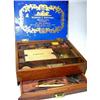 Image 1 : A mid 19th century Winsor and Newton mahogany paint box containing blocks of paint, ceramic mixing..