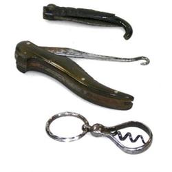 A penknife, a button hook and a corkscrew, the former folding into a deer horn, the button hook fol.