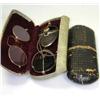 Image 1 : A pair of pince nez in yellow metal frames together with a pair of dark glasses with steel mesh sid.