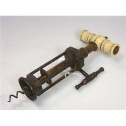 'Simpson, 55 Strand, London', a corkscrew, four steel bars open to the ratchet turned by a handle o.