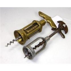 A bronze and an aluminium corkscrew, the former with T-bar handle and four open bar barrel and the..