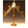 Image 1 : A Victorian Neogothic brass candelabra, the five lights arranged on a wavy edged inverted chevron b.