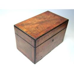 A George III burr oak tea caddy, the rectangular lid cross banded in kingwood and edged with ebony..