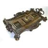 Image 1 : An early Victorian bronze inkwell, the shaped rectangular tray with two foliate handles, the pen tro
